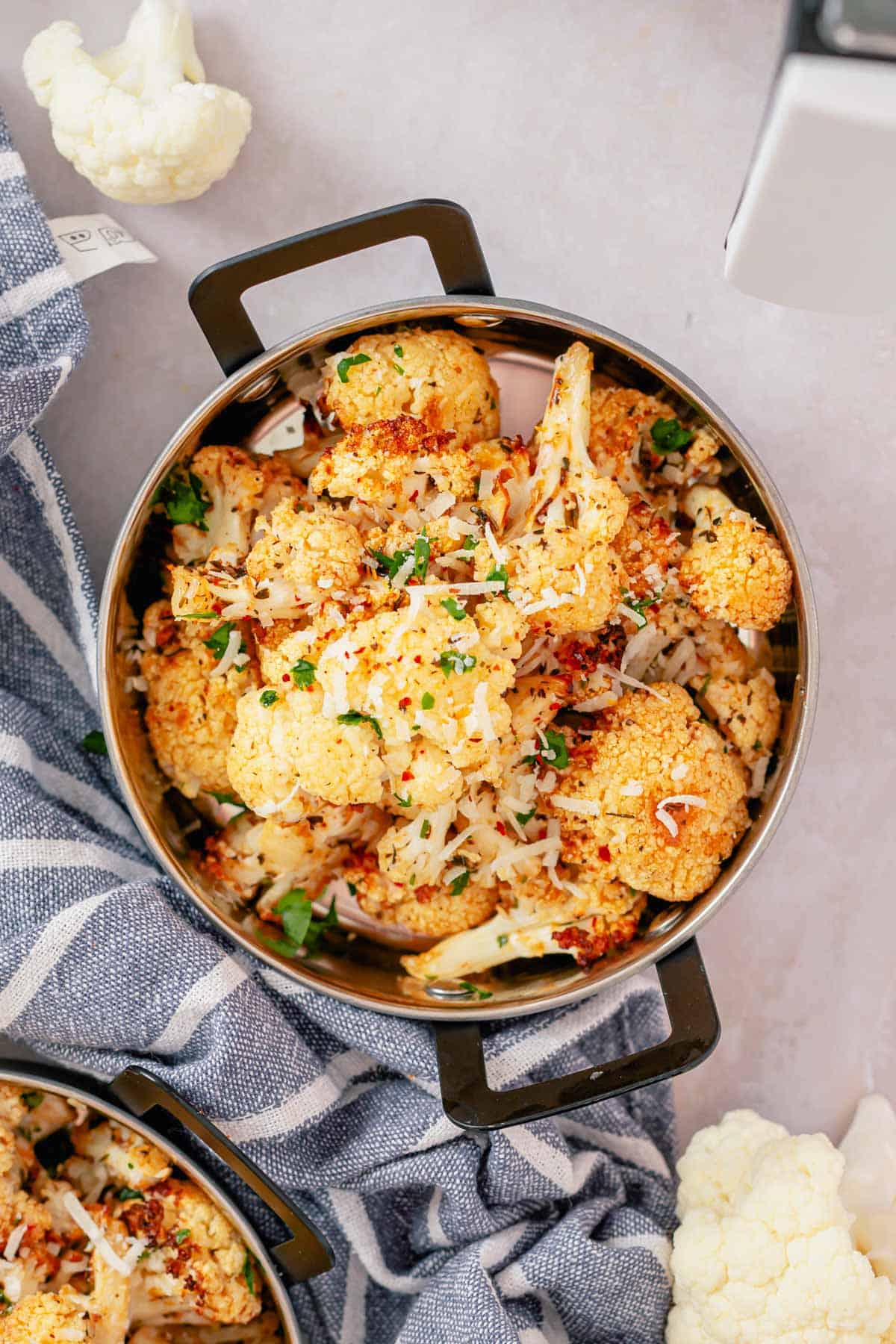 air fryer cauliflower in small metal serving dish