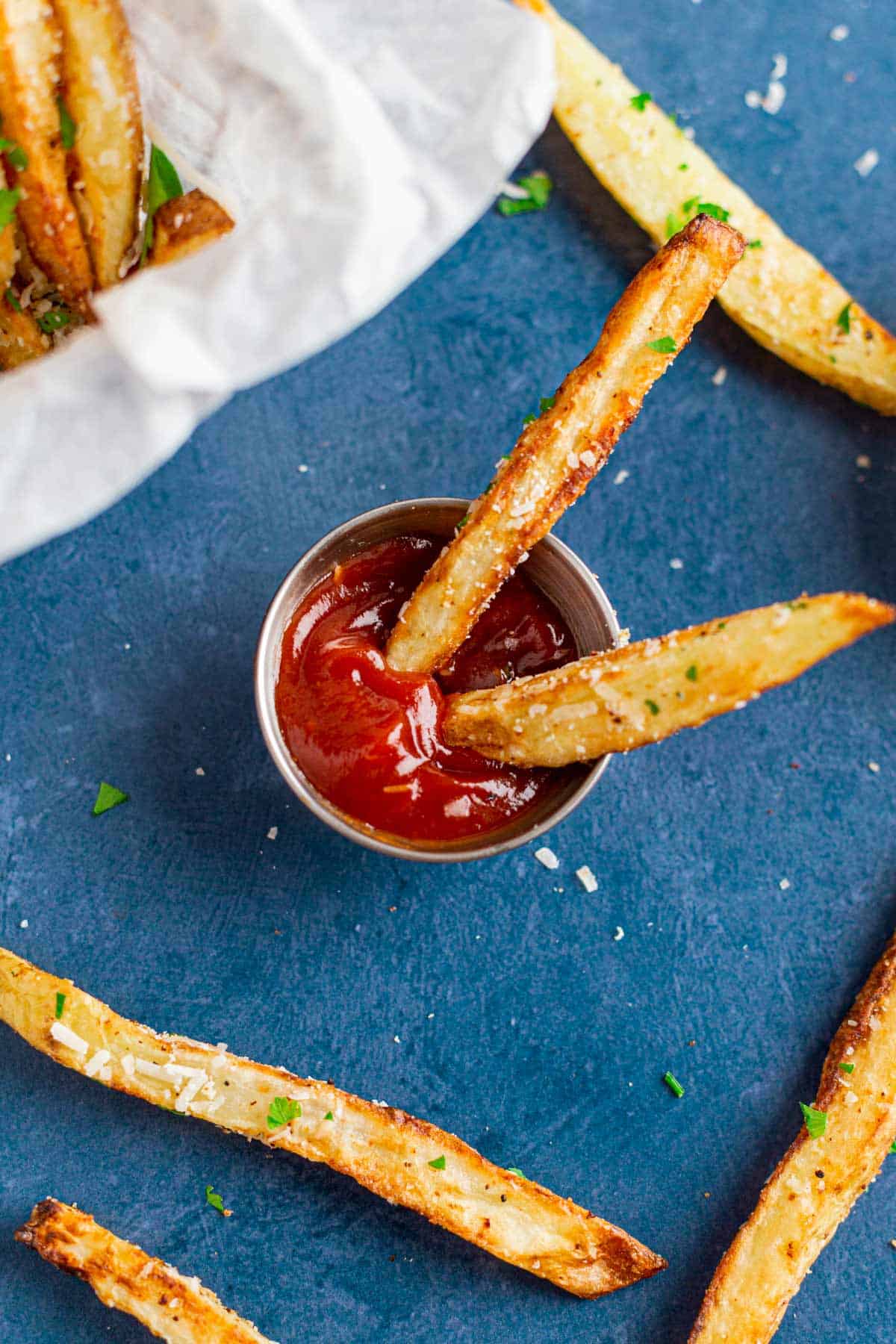 Air Fryer French Fries With Parmesan in ketchup