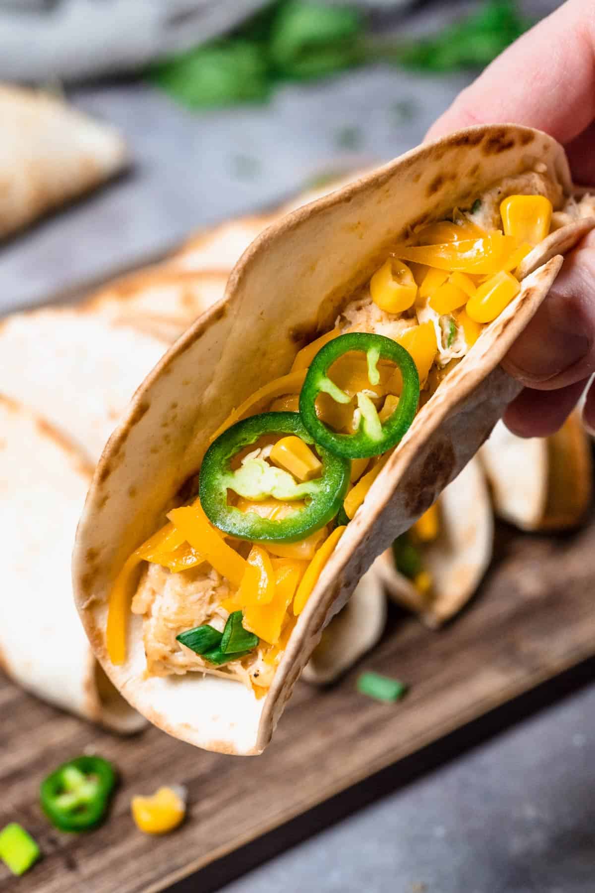 Creamy Chicken Tacos close up shot in hand