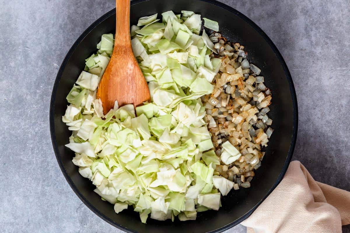 cabbage and onion in the skillet