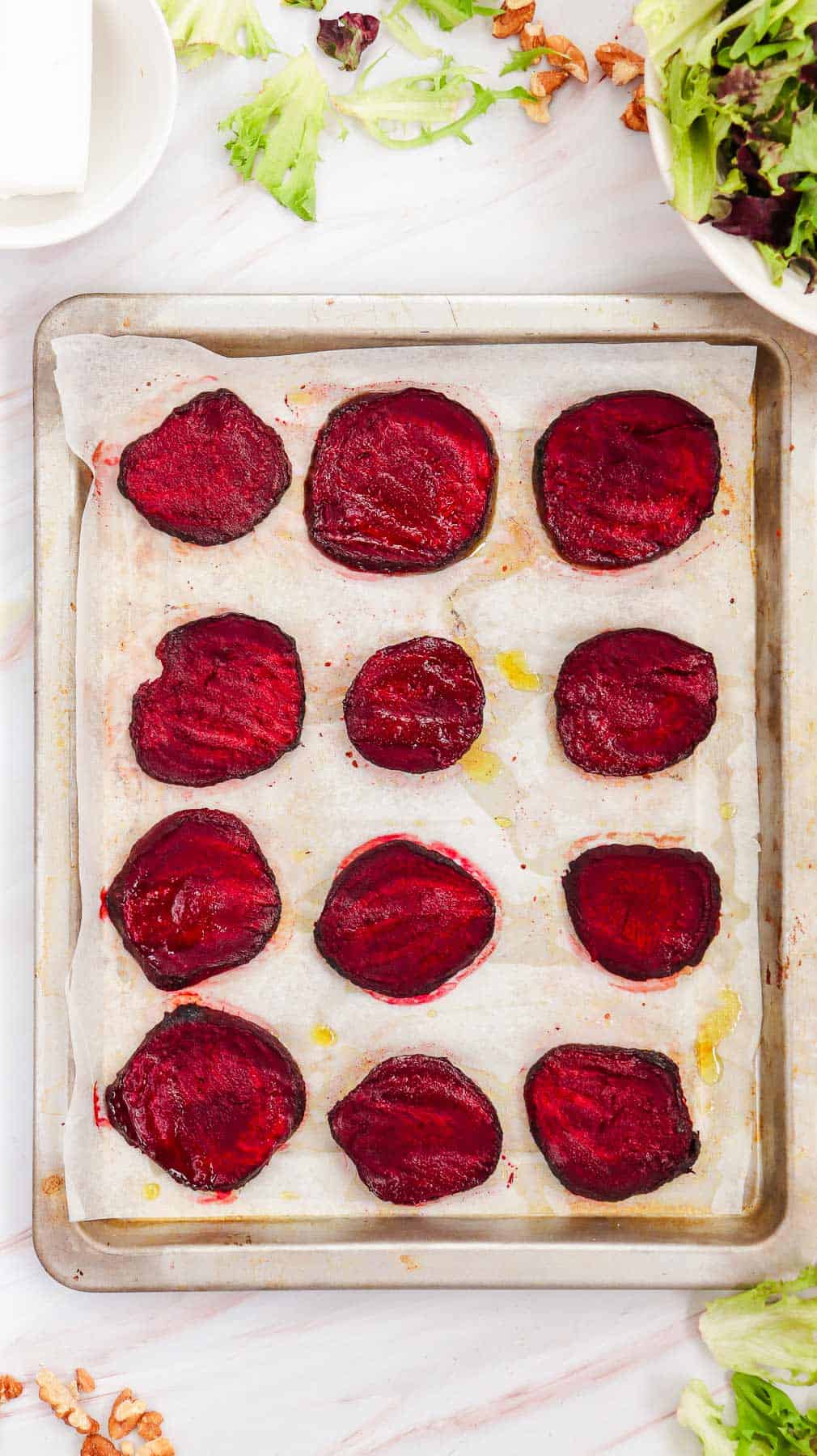 roasted beet slices on baking sheet.