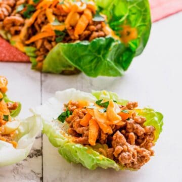 a stack of beef lettuce wraps