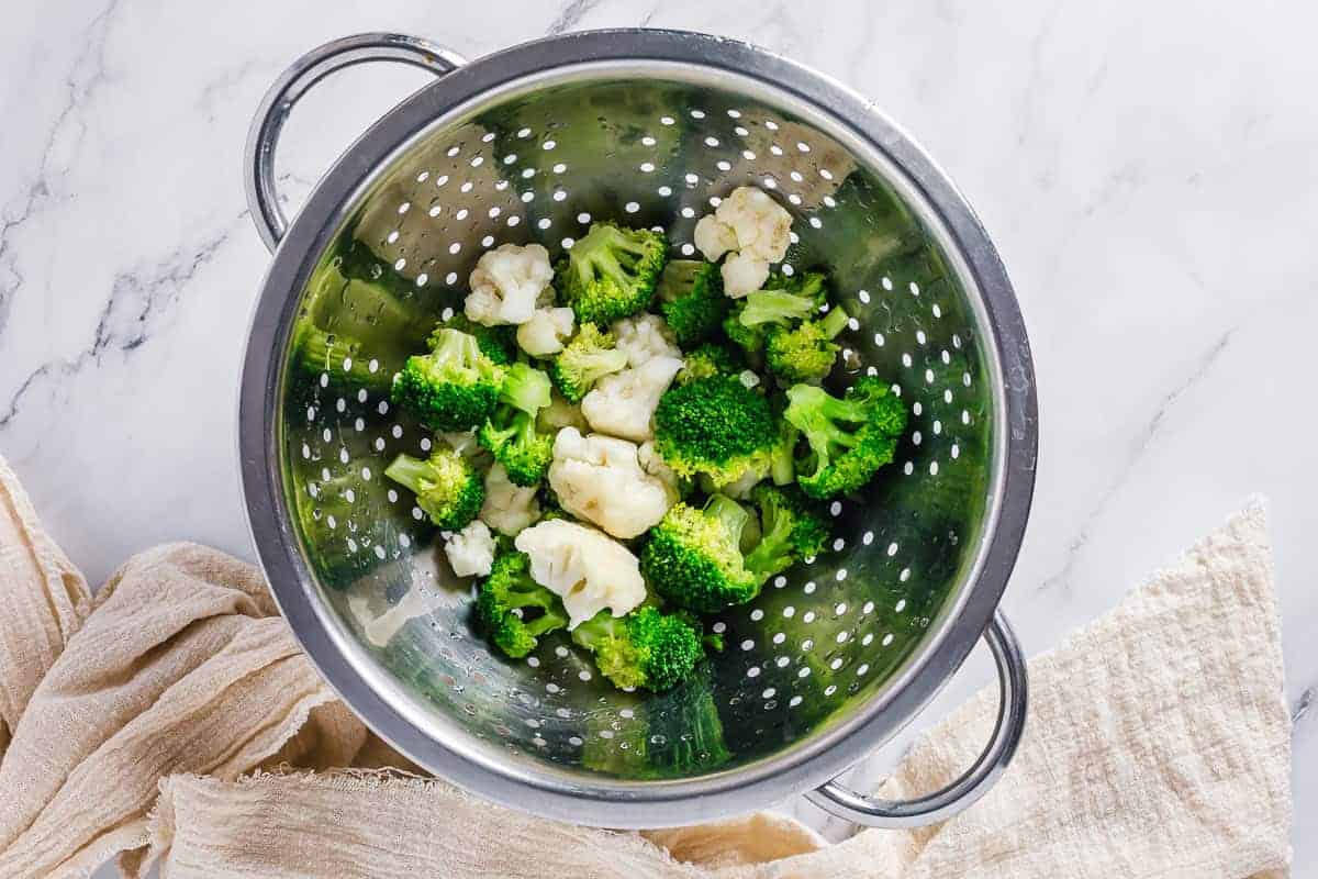 broccoli and cauliflower in a strainer