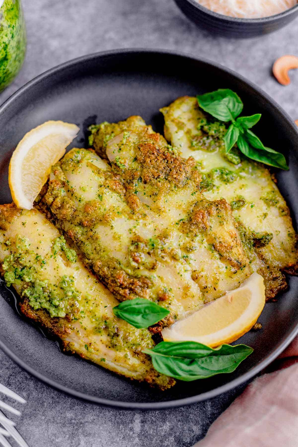 air fryer tilapia with pesto in a plate