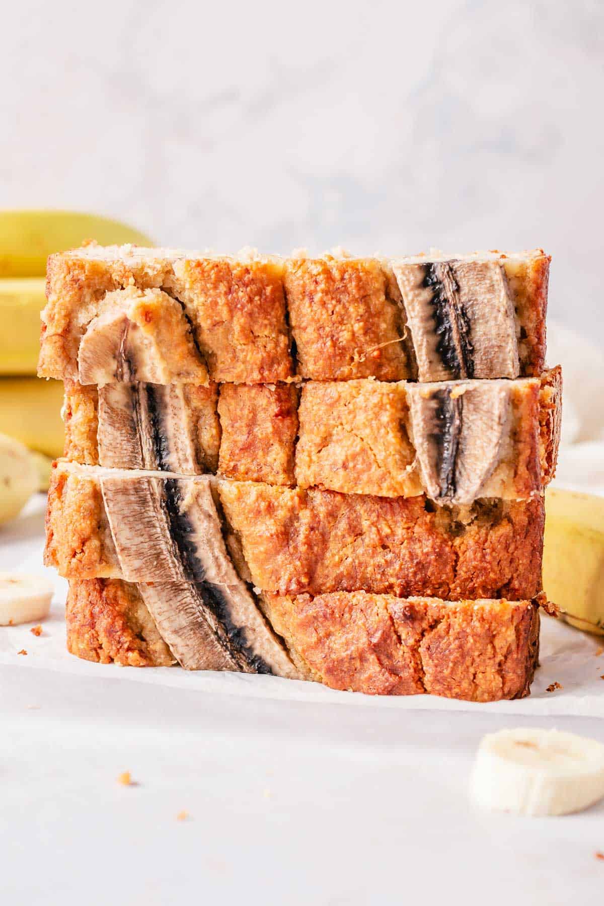stack of four banana bread slices on top of each other