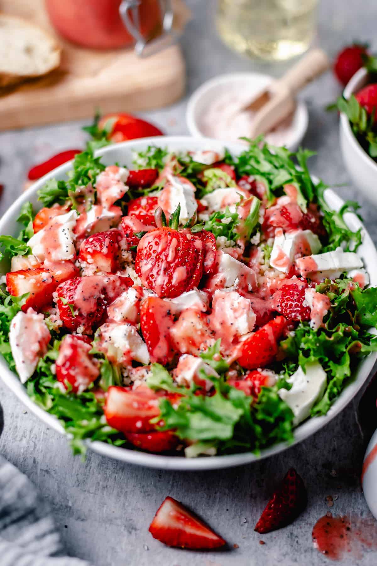 bright strawberry salad in a white bowl