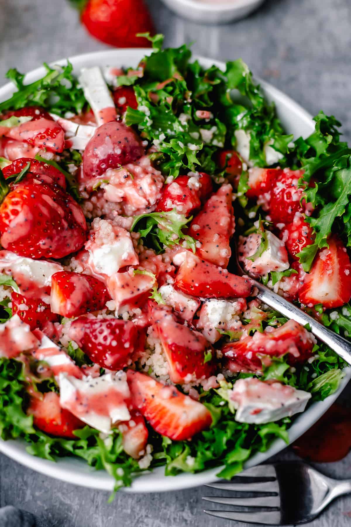 bright strawberry salad in a white bowl