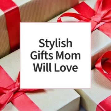 Elegant gift boxes with red ribbons for stylish mom gift ideas.