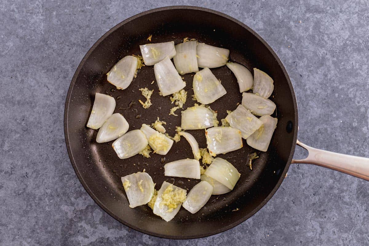 onions and garlic frying ina pan for stir fry