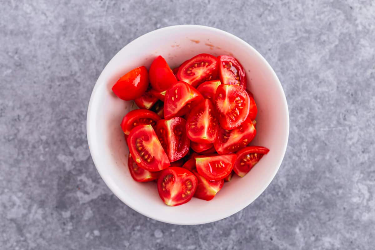 freshly cut tomatoes in a bowl