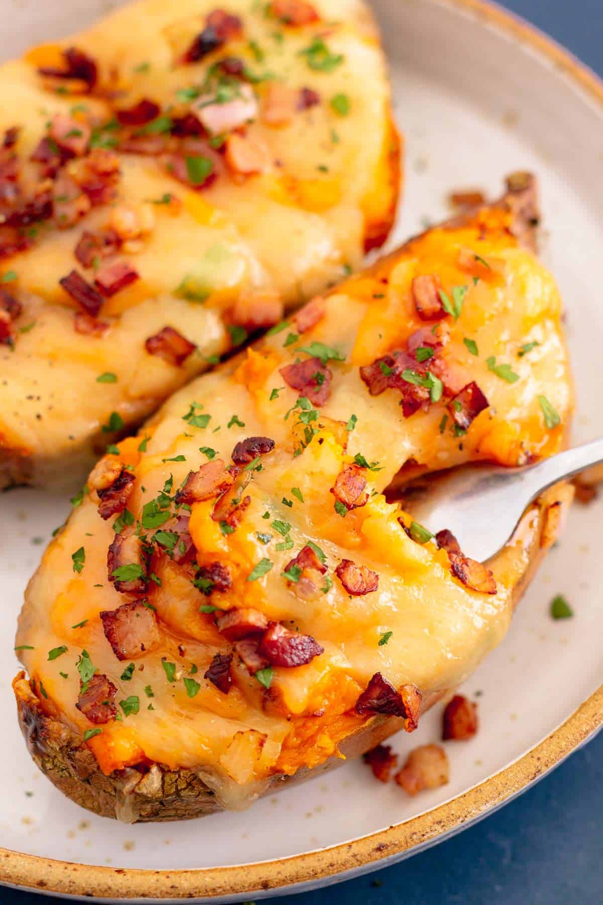 Twice Baked Sweet Potato With Bacon And Cheese - The Yummy Bowl