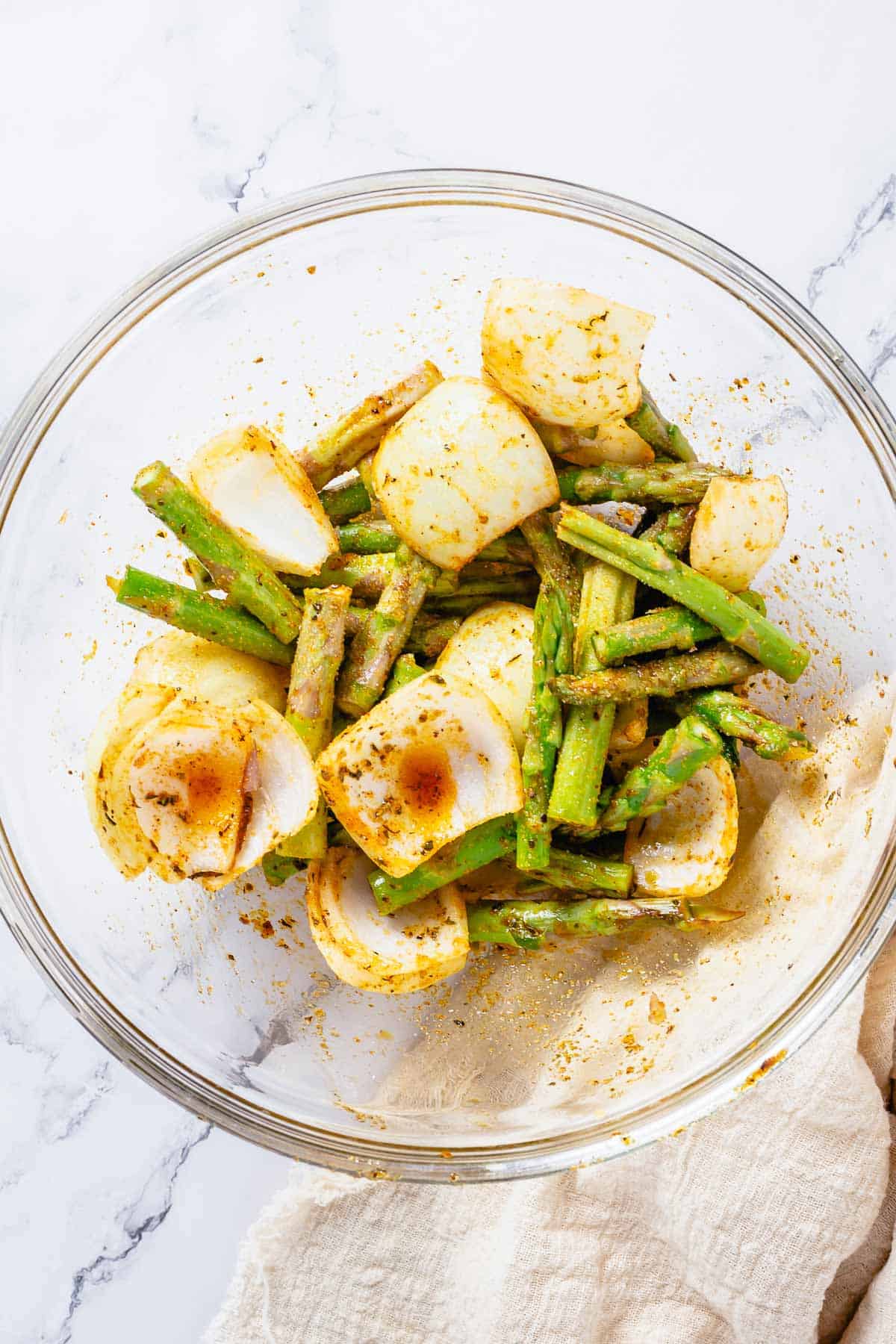 onions and asparagus drizzled with marinade