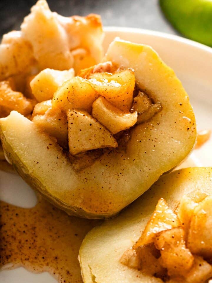 green baked apple cut in half.