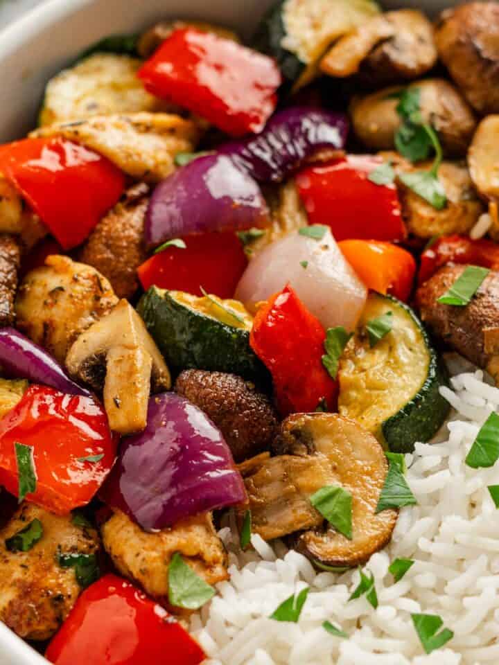a bowl of air fryer chicken with vegetables.