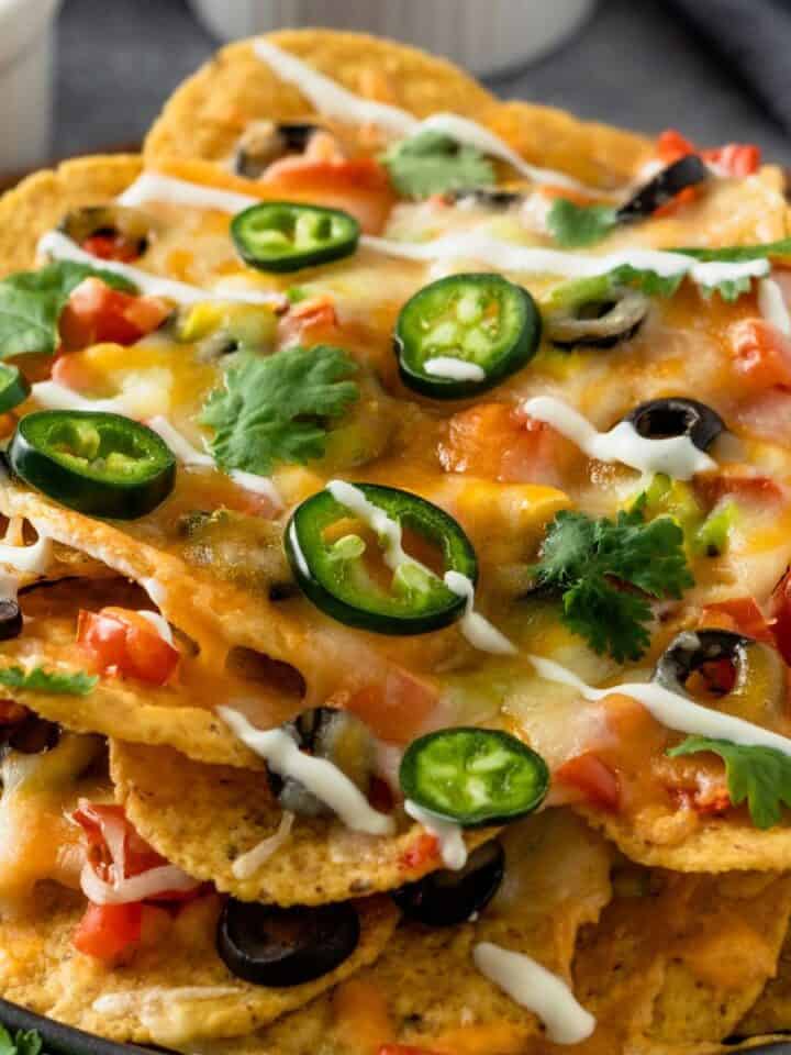 air fryer nachos with cheese and toppings.