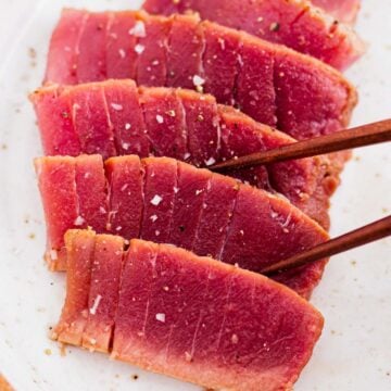 air fryer tuna steak on a bed of cauliflower puree and tomato salsa