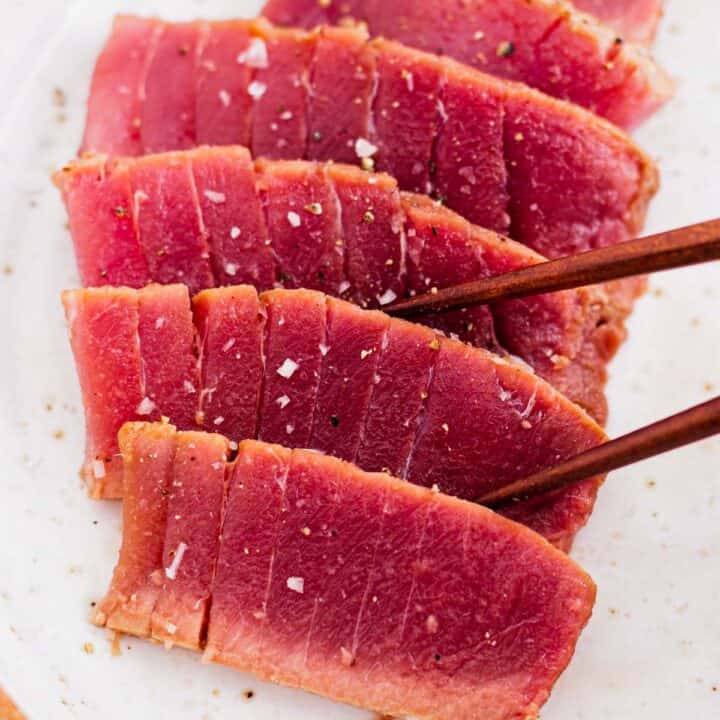 air fryer tuna steak on a bed of cauliflower puree and tomato salsa