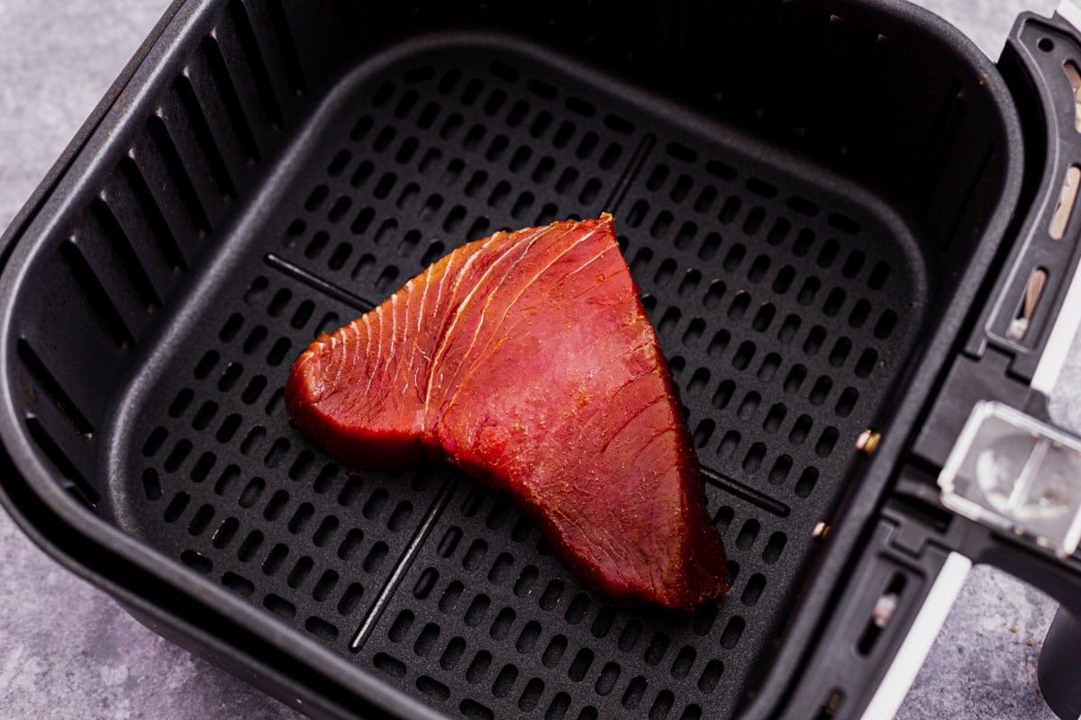 air fryer tuna steak before frying in the air fryer basket