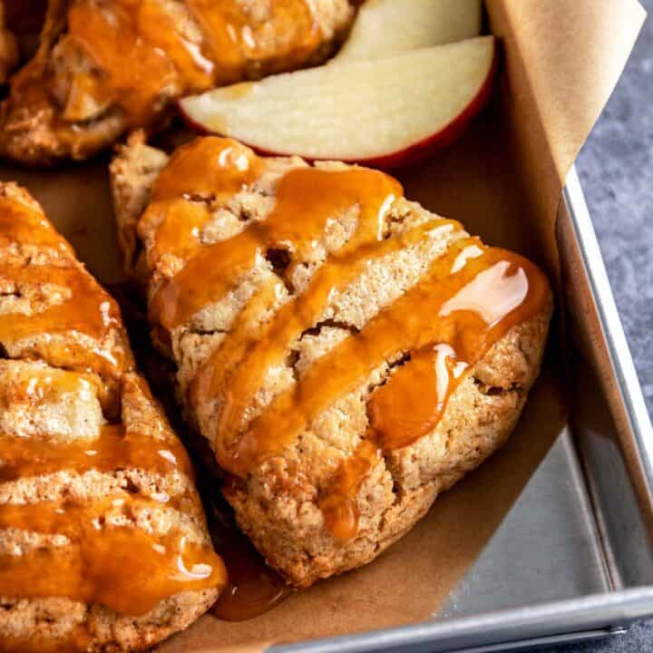 apple scones with caramel sauce drizzle.