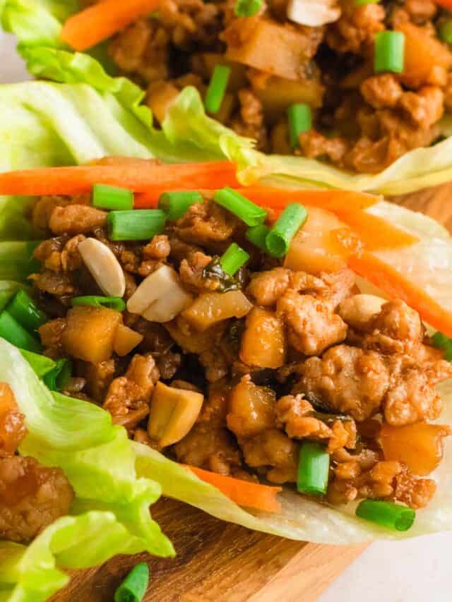 Asian chicken lettuce wraps filled and ready to serve.