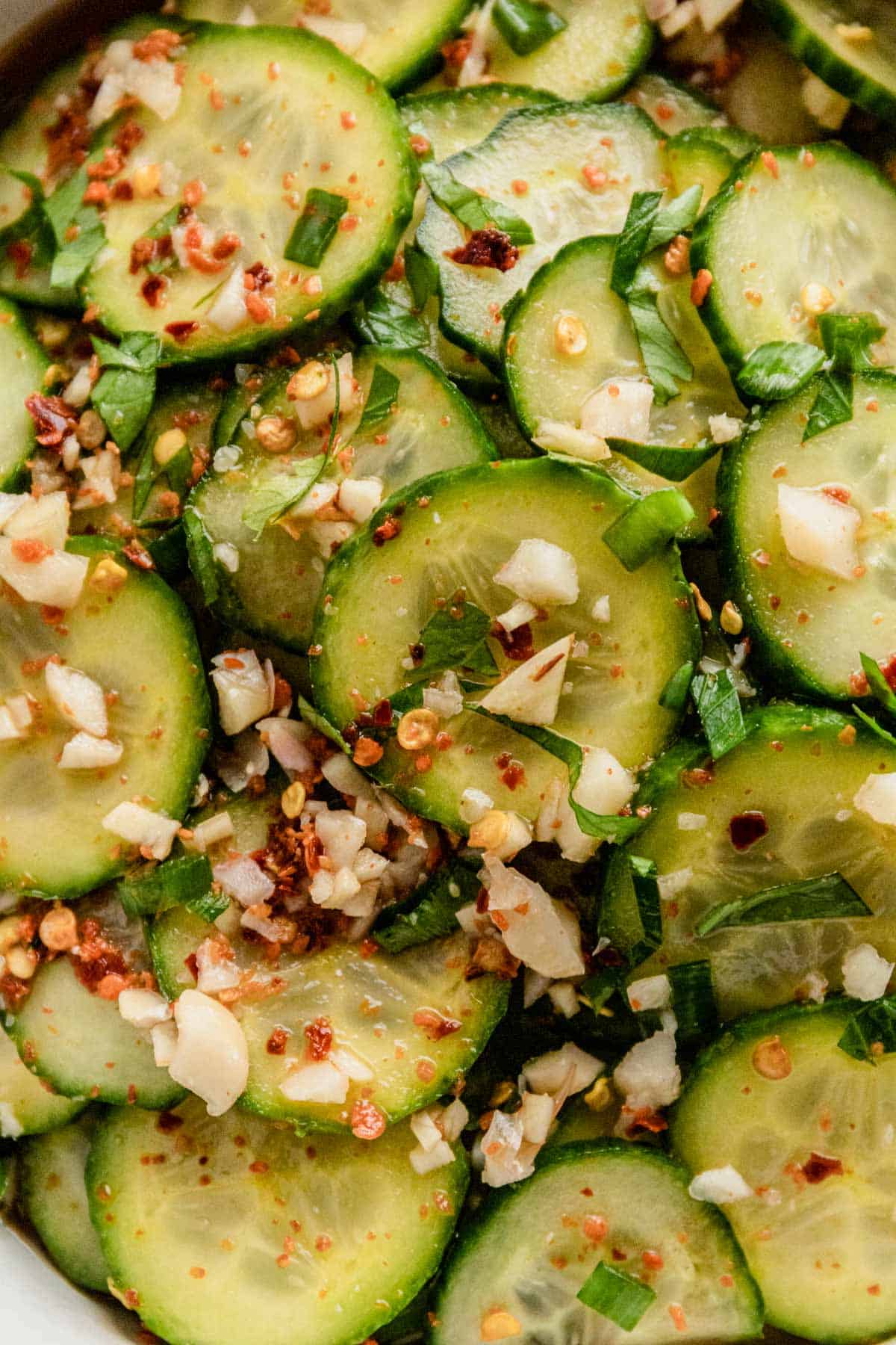 asian cucumber salad with peanuts in a bowl