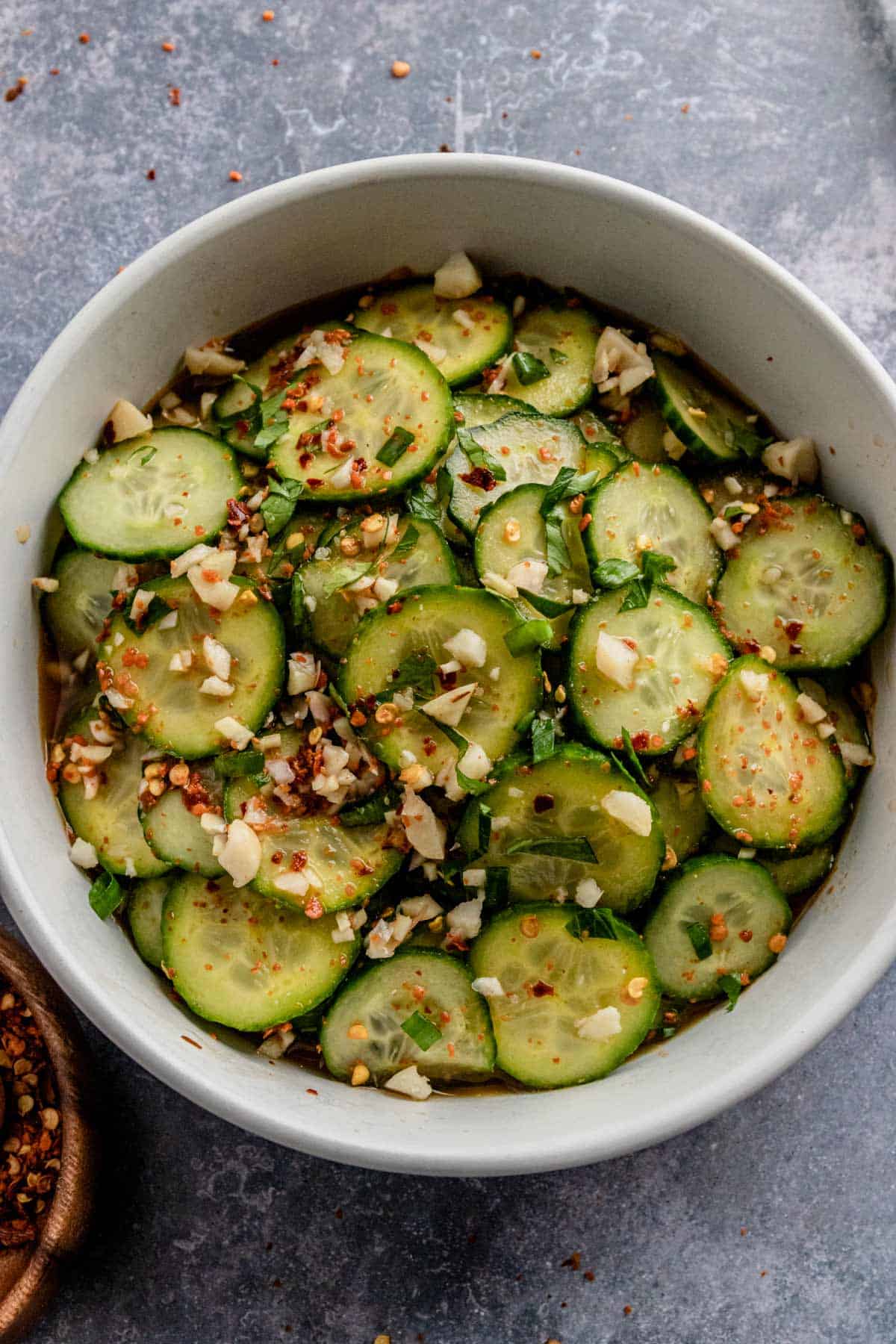 spicy cucumber salad with peanuts in a bowl
