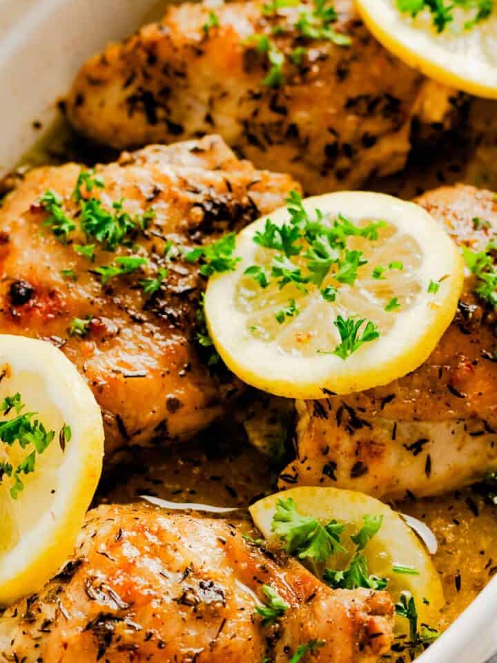 greek lemon chicken in baking dish.