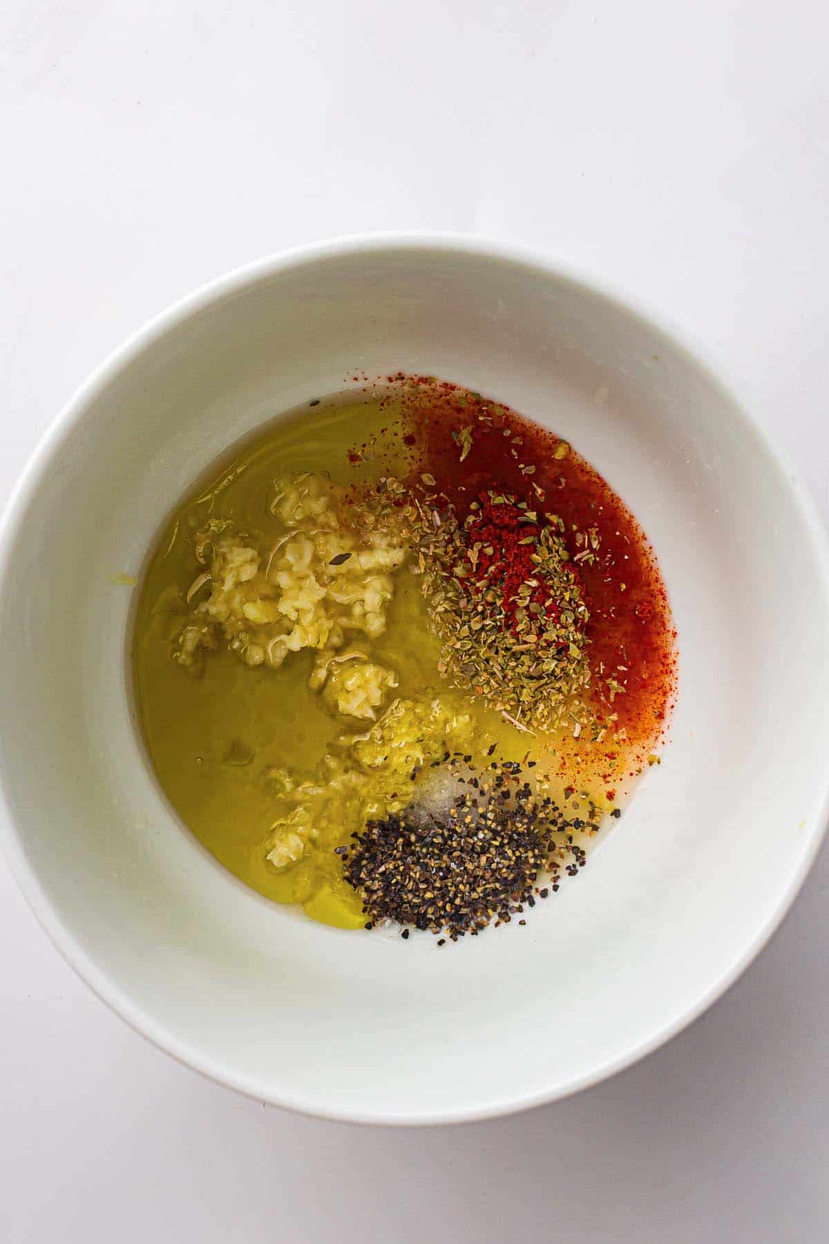 Olive oil lemon garlic seasoning for baked chicken.