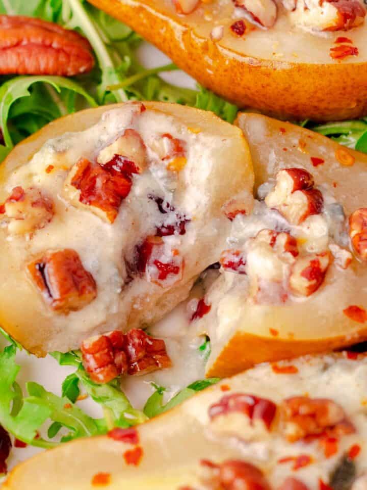 Roasted pears with blue cheese, nuts and cranberries and honey.