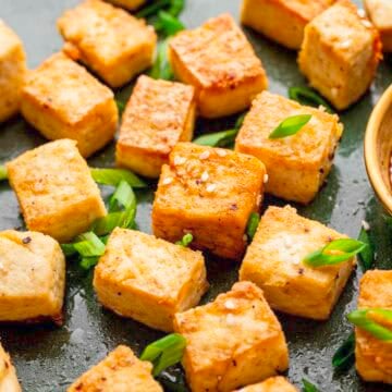 Baked Tofu with soy sauce and spring onions.