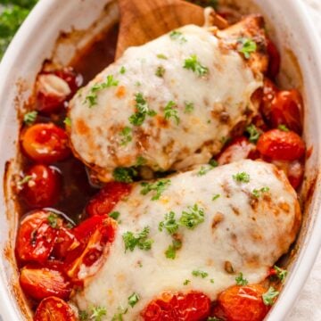 Chicken breast coated in balsamic marinade and baked with cherry tomatoes and mozzarella cheese.