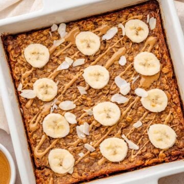 Peanut Butter Banana Baked Oatmeal with banana slices and peanut butter drizzle.
