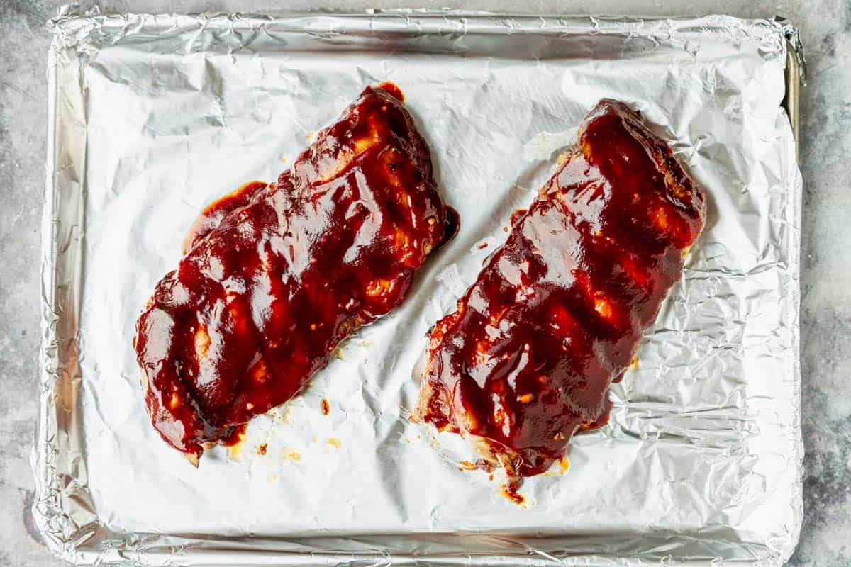 pork ribs brushed with barbecue sauce.