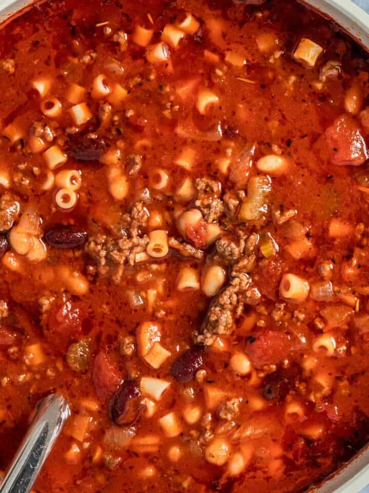 red soup with tomato sauce, beef and vegetables.