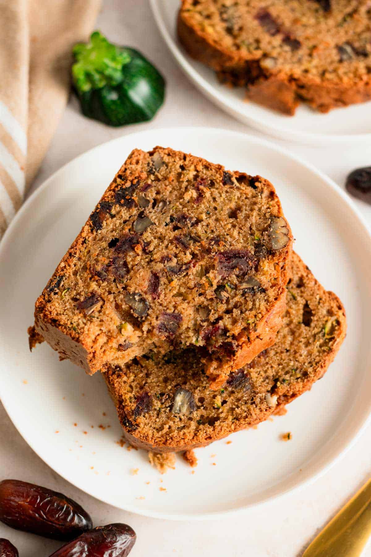 Slices of Zucchini nut bread with dates.