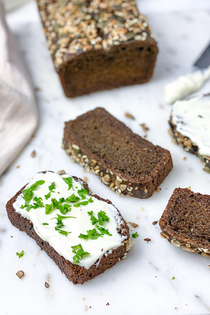 This Sunflower and Flaxseed Bread is a tender, moist, fiber-rich loaf that is packed with flaxseeds, sunflower, chia, and cumin seeds. This easy to make quick bread is perfect for breakfast, a mid-morning snack, or your favorite toasts spread.