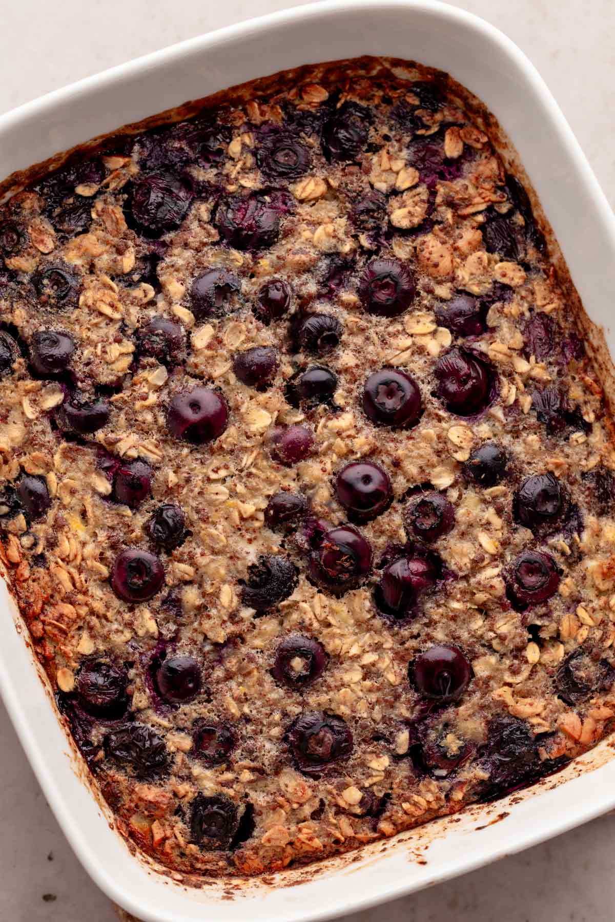 freshly baked oatmeal with blueberries and banana.