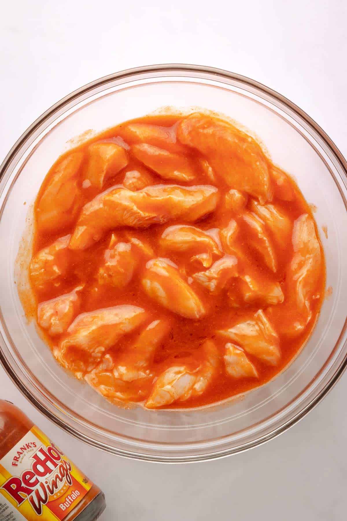 Chicken pieces marinated in buffalo sauce.