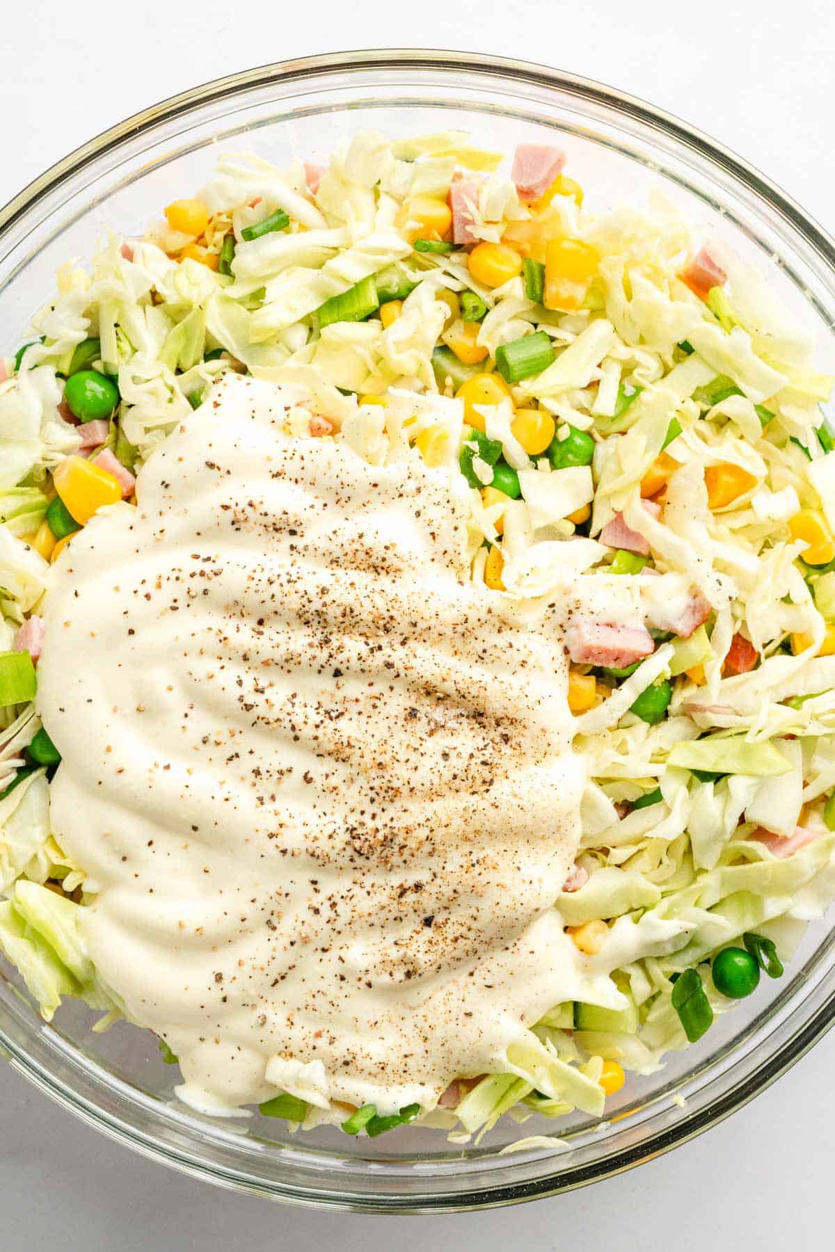 Making the Cabbage, Corn and Ham Salad.
