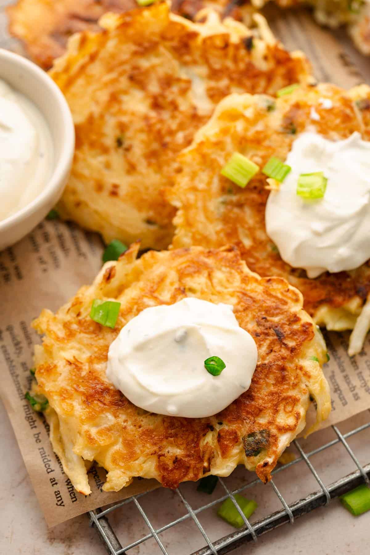 Savory cabbage pancakes served with sour.