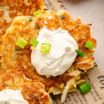 Savory cabbage pancakes served with sour.