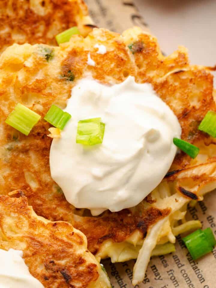 Savory cabbage pancakes served with sour.