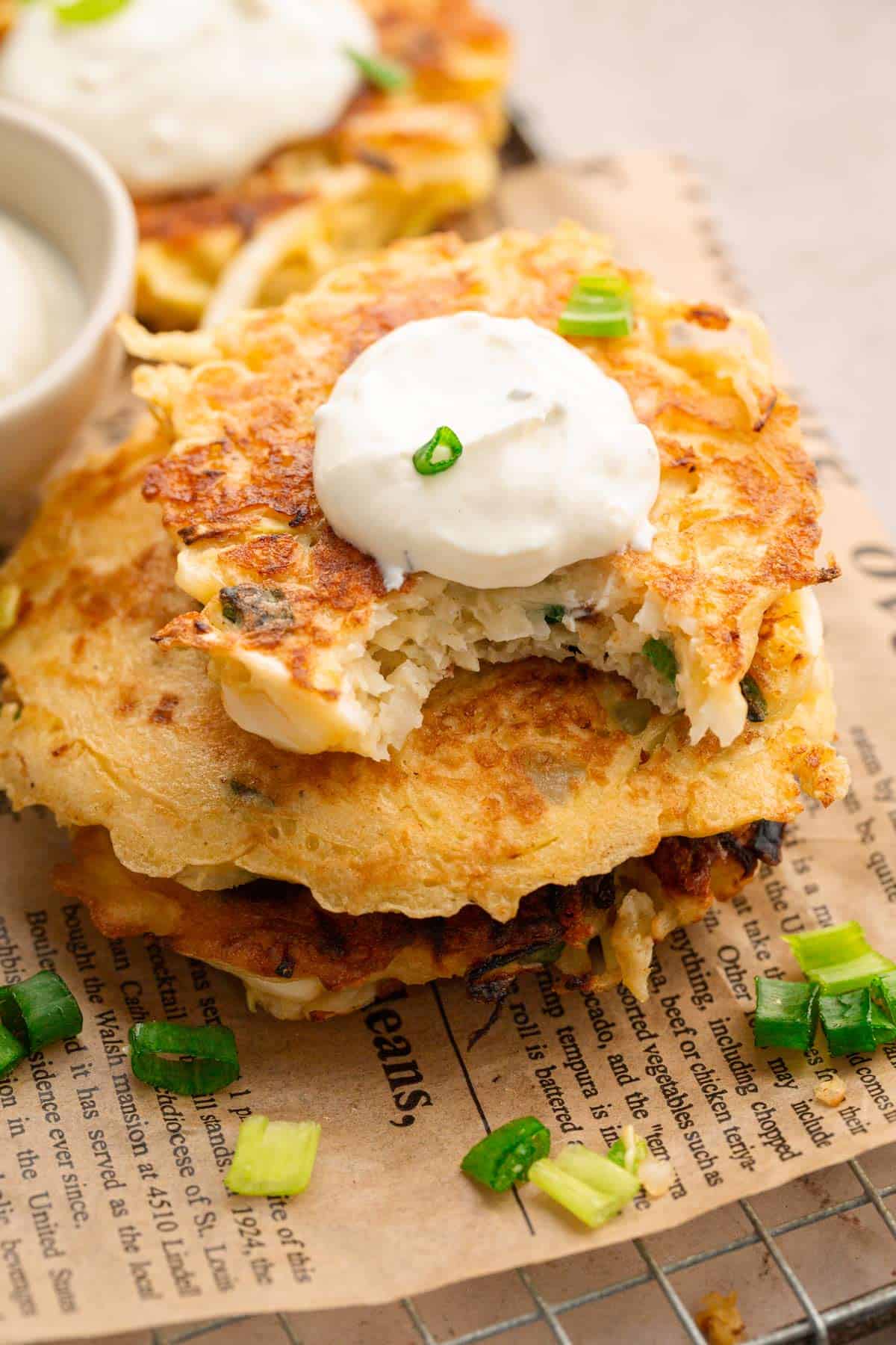 Savory cabbage pancakes served with sour.