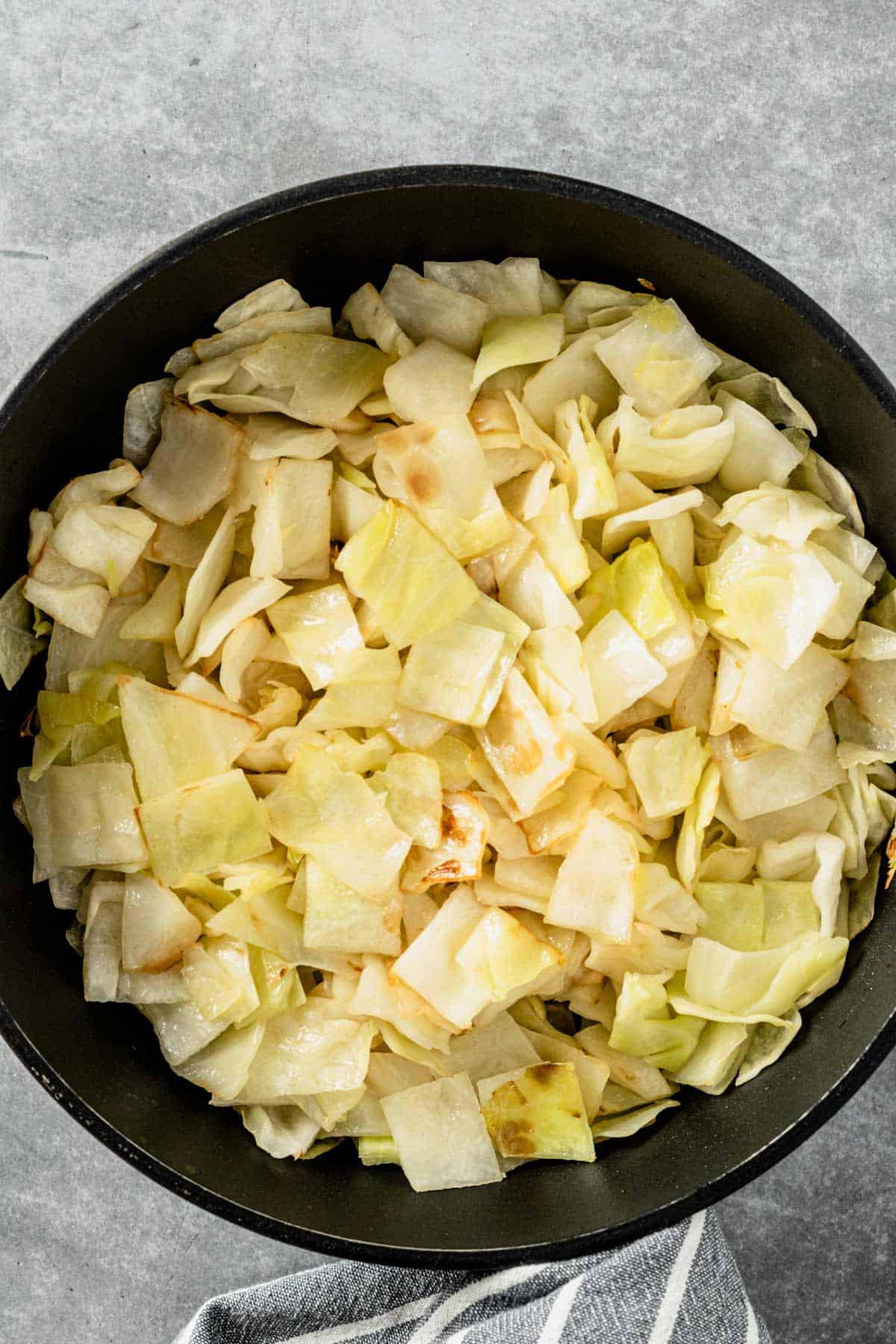 cabbage cooking in skillet