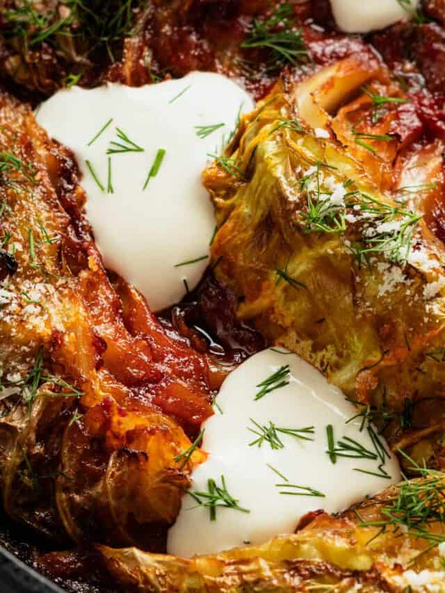 caramelized cabbage wedges in skillet.