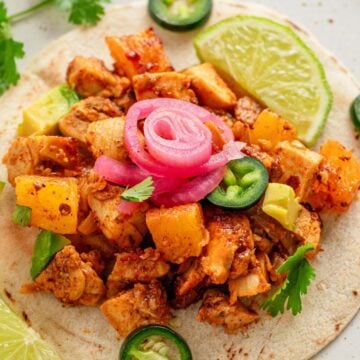 tacos with diced blackened chicken and toppings.