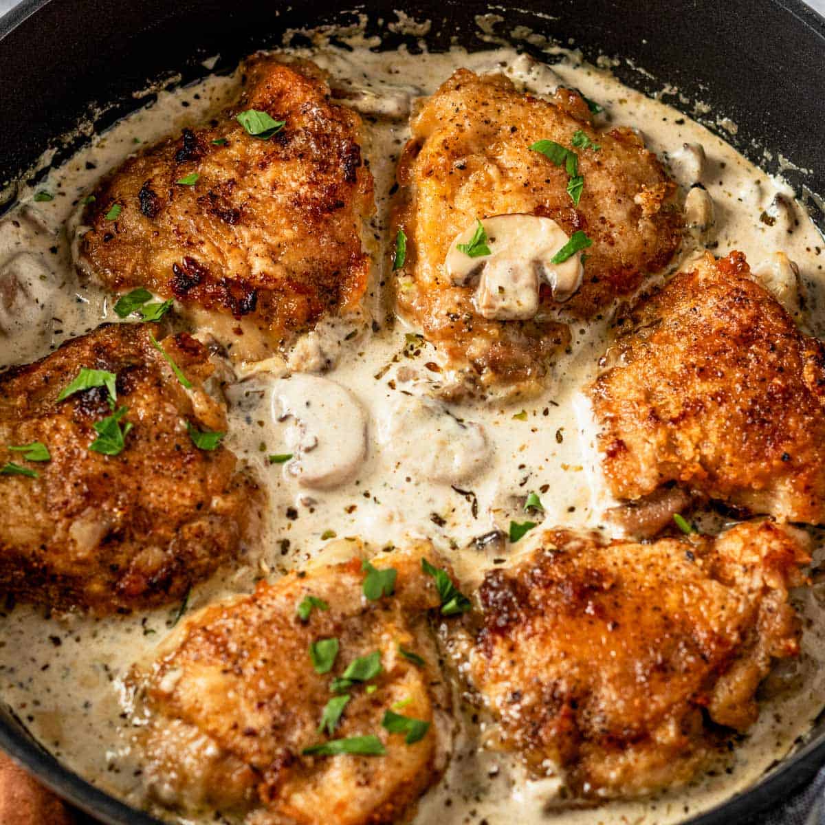 Creamy Garlic Mushroom Chicken Thighs (30-Minute Dinner) - The Yummy Bowl