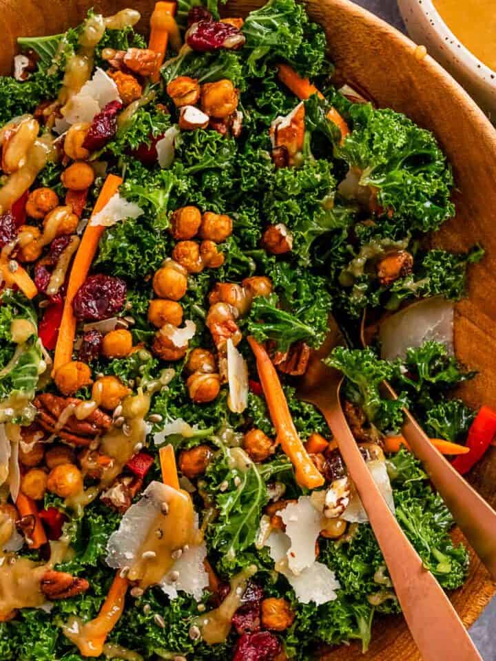 kale salad with lemon tahini dressing in a serving bowl