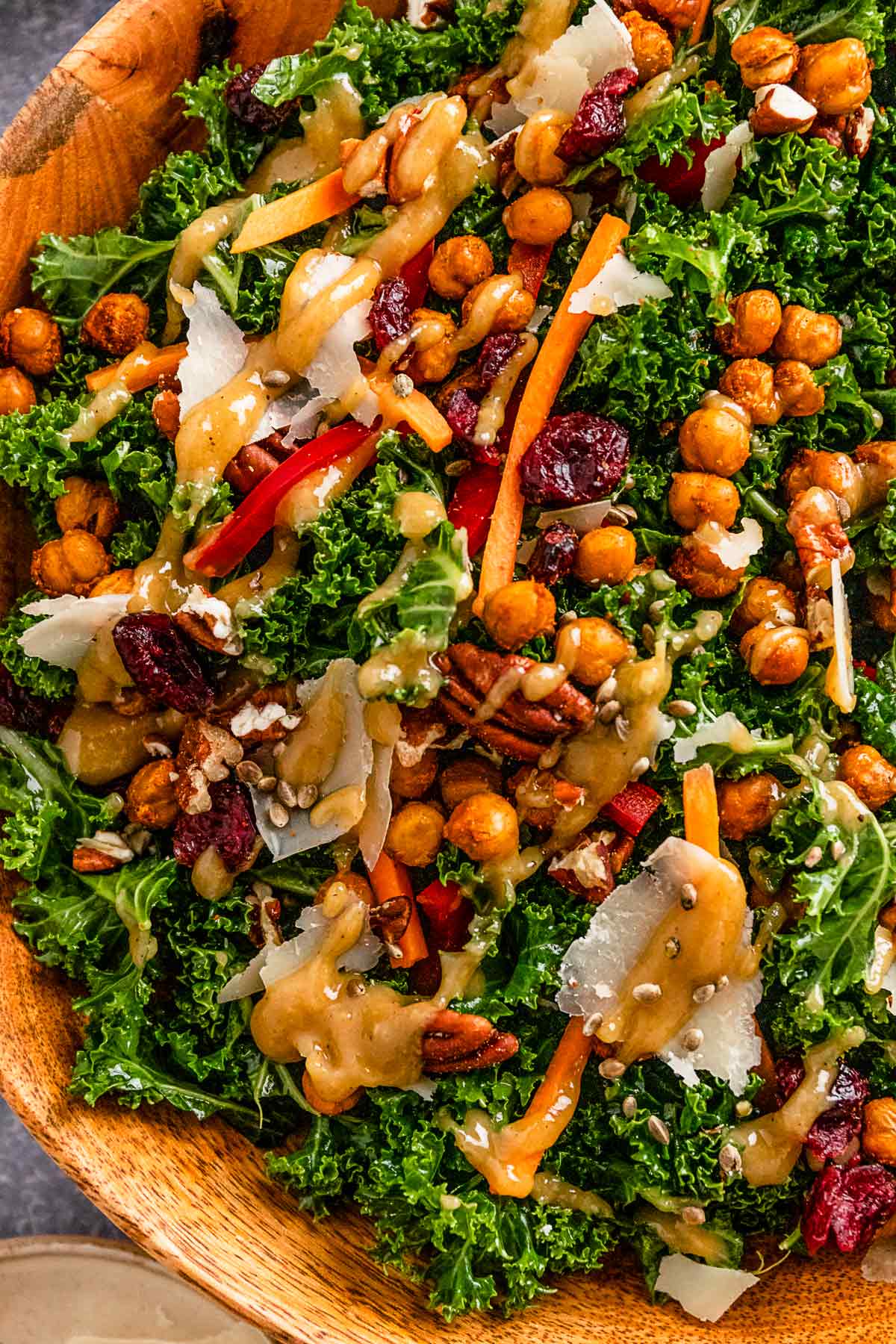 kale salad with lemon tahini dressing in a serving bowl