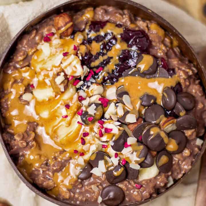 chocolate porridge bowl with toppings.
